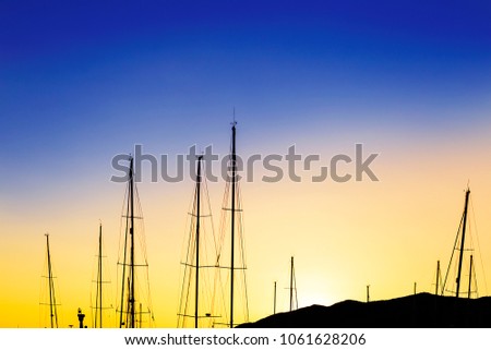sunset in the mountains, masts in the sun