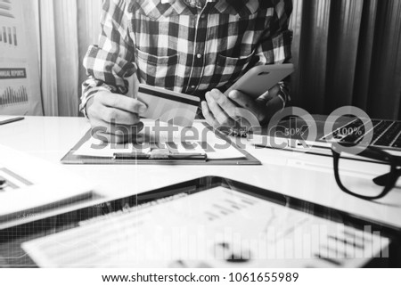 Young man working serious business financial account in office workplace, vintage picture style.