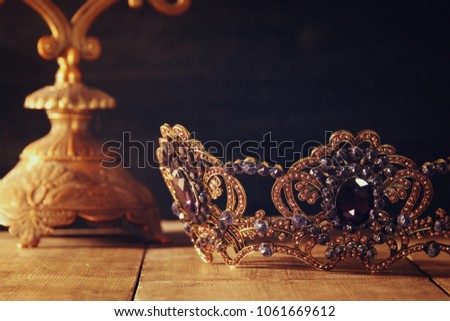 low key image of beautiful queen/king crown. fantasy medieval period. Selective focus
