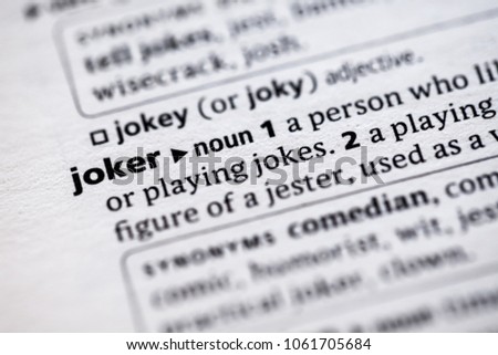 Close up to the dictionary definition of Joker
