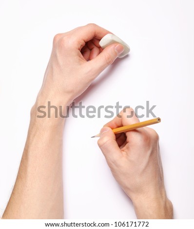 Image of human hands with pencil and eraser on white