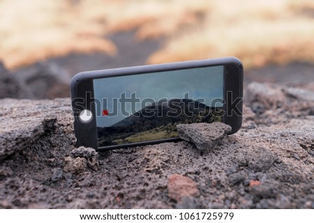 Close up screen of smartphone device shots time lapse video with landscape travel and smartphone concept