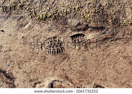 human footprints in the mud