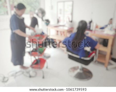 Blurry image in beauty salon with customers to use. Symbol of business, beauty and fashion hairstyles.need blur picture