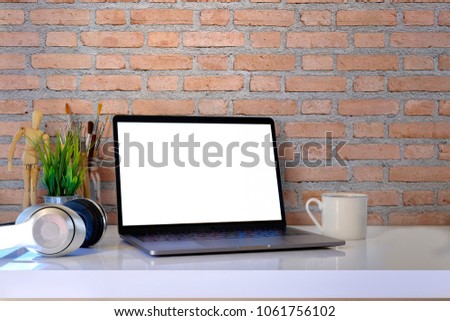 Stylish workspace with laptop computer. 
