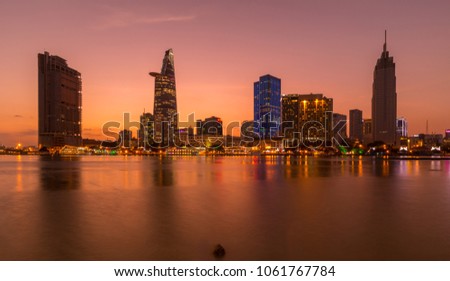 Royalty high quality stock image aerial view of Ho Chi Minh city, Vietnam. Beauty skyscrapers along river light smooth down urban development in Ho Chi Minh City