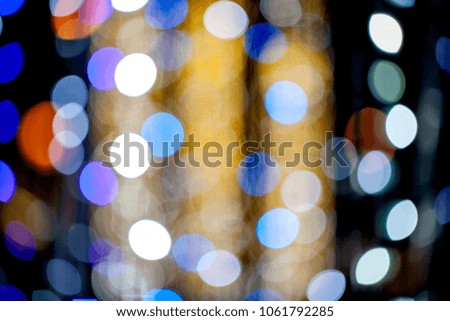 Abstract background colorful blurred bokeh of light from a light bulb.
