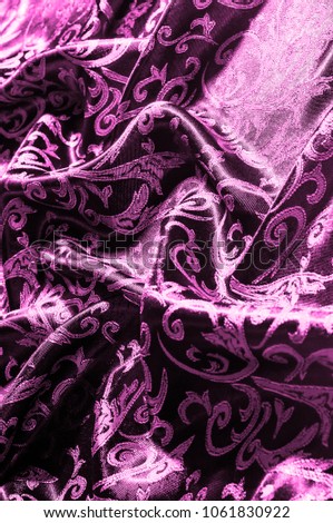 texture background pattern of silk fabric Royal monogram. pink. It is a red cranberry velvet with a royal gold font, creating a classic floral pattern. Light weight, great for design.