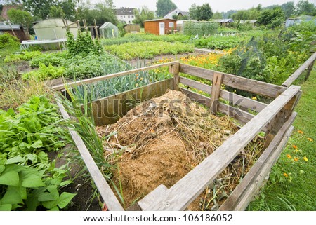 	Compost bin in a vegetable garden -  vitamins healthy biological homegrown spring organic - stock image
