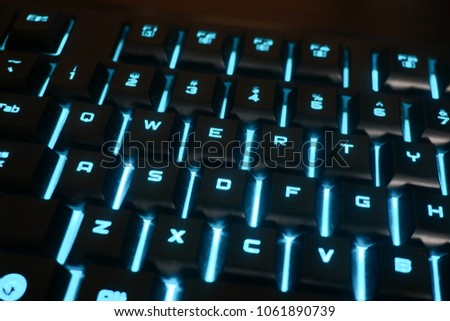 A led back-lit keyboard close up with a very tech vibe and feel