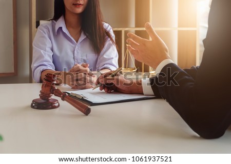 Law should know concept, The lawyer explained to the client to plan the case in court. Royalty-Free Stock Photo #1061937521