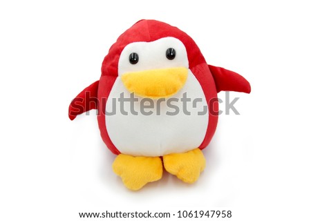 Red Penguin doll isolated on white background.