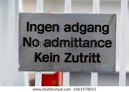 No admittance sign - danish, english and german.