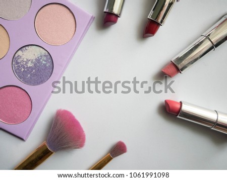 summer set of pink tone  make up tools with brush and lipsticks