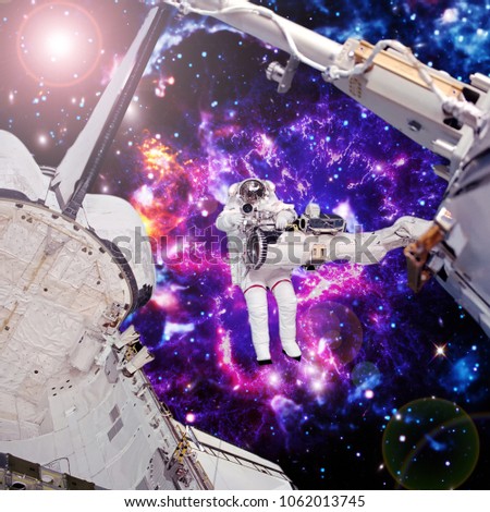 Spaceship and astronaut flying in space. The elements of this image furnished by NASA.