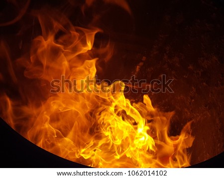 Burning  silver and gold paper, Chinese people believe the burning paper money, or silver and gold paper for worship to ancestors who have passed away, in chinese new year festival.Select focus Royalty-Free Stock Photo #1062014102