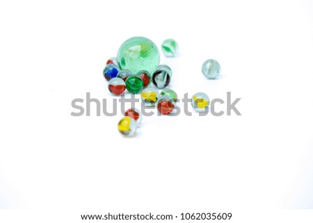 Colorful glass marbles, on white background
