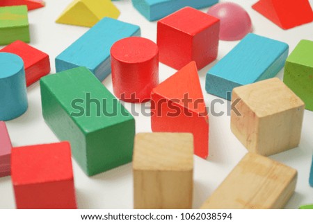 Toys blocks, multicolor wooden bricks, children colorful building game pieces of kids organize toy. Flat lay and isolated white background