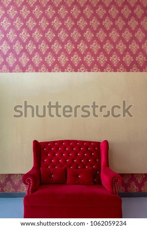 Elegant red sofa with blank backdrop texture background