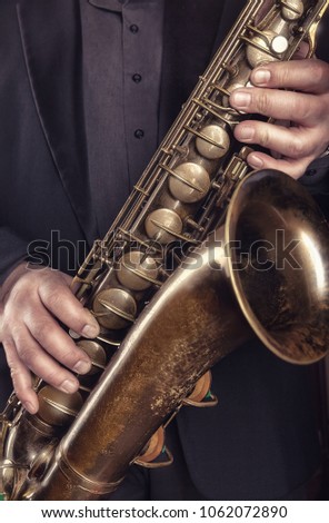 Saxophone player jazz music instrument. Alto sax musical instrument closeup