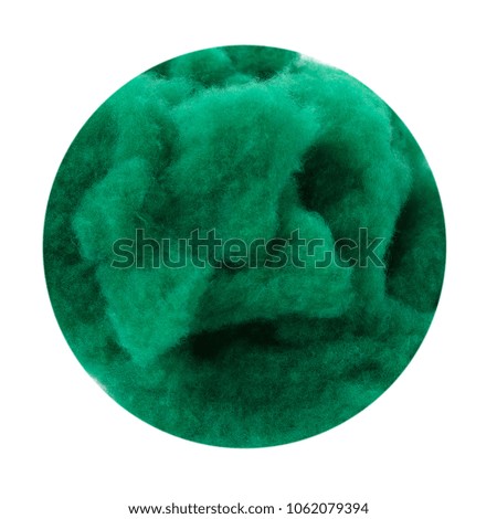 Texture of wool, cashmere, cut in a circle on a white background, industrial cashmere, coarse wool like a cloud, green, close macro