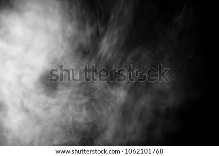Smoke texture for designers works - abstract photo texture of the real smoke on the black background for adding and editing as background layer in the screen regime