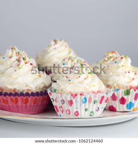 Row of birthday cupcakes