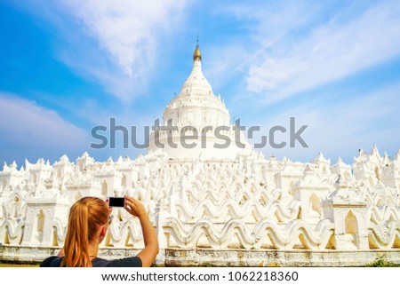Female Tourist Taking Mobile Photo of Hsinbyume Pagoda in Myanmar (Burma)