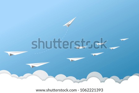 Paper airplane as a leader among another airplane , leadership, teamwork on blue sky background.