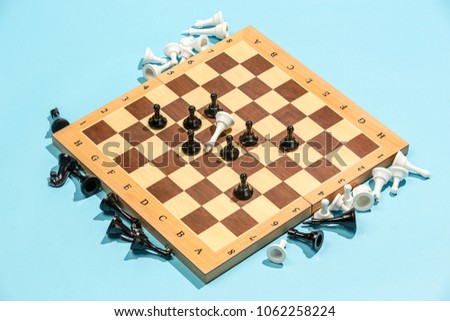 Chess board and game concept. Business ideas, competition, strategy and new ideas concept. Chess figures on blue background. Selective focus. Above view. Side view. Win, victory, winner concepts