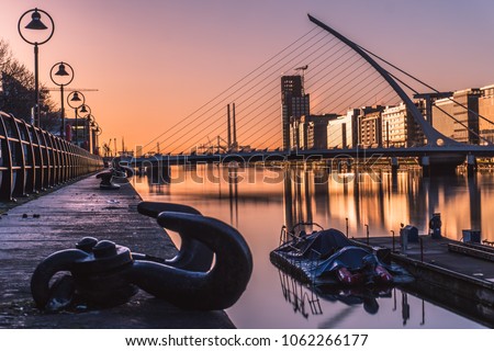 Sunrise in Dublin, Samuel Backett Bridge, River Liffey, Ireland Royalty-Free Stock Photo #1062266177
