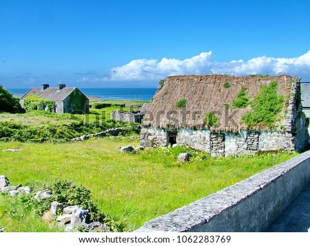 Thatched Cottage on Inis Mór, Aran Islands, Ireland Royalty-Free Stock Photo #1062283769