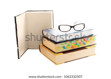 A stack of books isolated on a white background.
