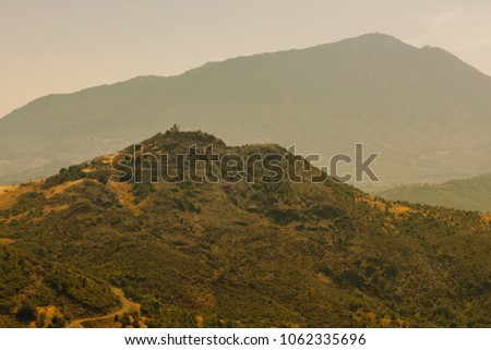 A small church on top of a mountain in Greece  in the Zagoria region. National park of Pindus mountain