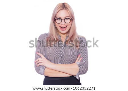 Business portrait of a beautiful young blond woman with glasses. Girl posing on white background in black skirt and striped blouse