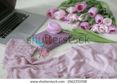 Purple tulips, laptop and women's trivia