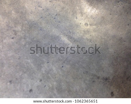 Surface of stainless steel with scratches.