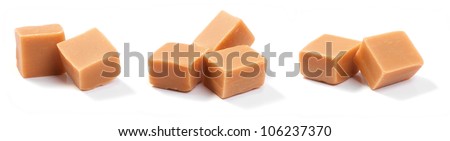Different groups of caramel candy, isolated on a white background. Royalty-Free Stock Photo #106237370