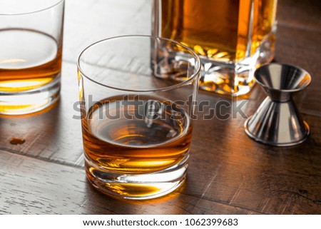Delicious Bourbon Whiskey Neat in a Glass Royalty-Free Stock Photo #1062399683