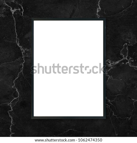 Mock up blank poster picture frame hanging on black marble wall background in room - can be used mockup for montage products display and design key visual layout.