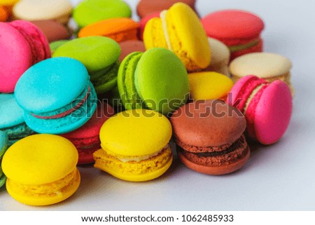 Close up macaron dessert pastel tones isolated on white background , It is a dessert made from meringue with egg white, iced sugar, white sugar, almond powder And food shape like a sandwich.