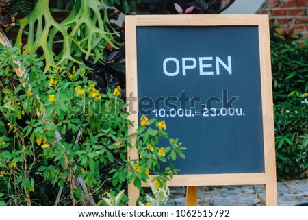 OPEN text in black board background, Restaurant background, Garden background