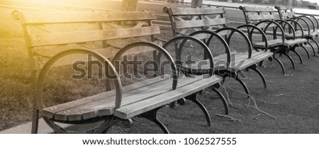Benches in fall park. Manhattan view. Hadson river