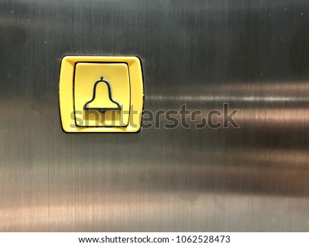 Alarm button for emergency in elevator.