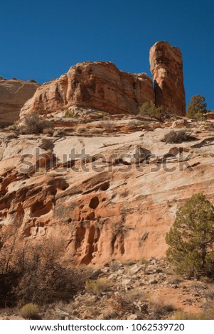 Unusual geologic rock formations viewed from Calf Creek Trail, Grand Staircase-Escalante National Monument and Zion National Park, Utah Royalty-Free Stock Photo #1062539720
