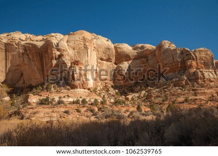 Unusual geologic rock formations viewed from Calf Creek Trail, Grand Staircase-Escalante National Monument and Zion National Park, Utah Royalty-Free Stock Photo #1062539765