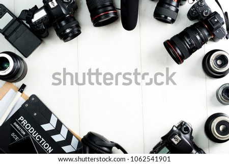 Cinema minimal concept. Watching film in the cinema. clapper board on yellow background. Screenwrite desktop Royalty-Free Stock Photo #1062541901