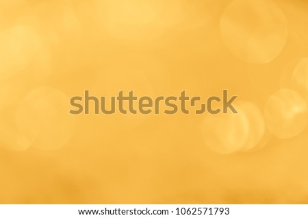 Golden gradient background with bokeh lights