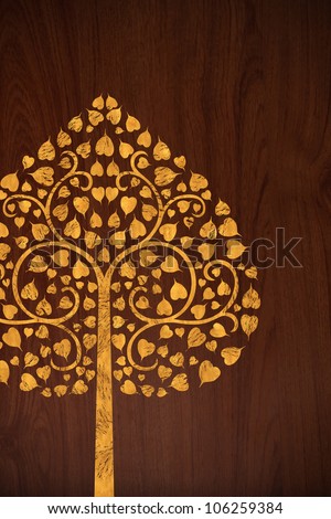 Pattern of carve gold tree on old wood texture