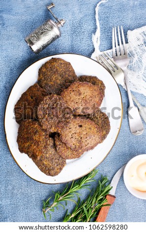 liver pancakes on plate, fried liver pancakes, stock photo